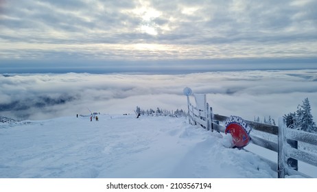 Ski Or Snowboard On Chairlift At Big White Resort,