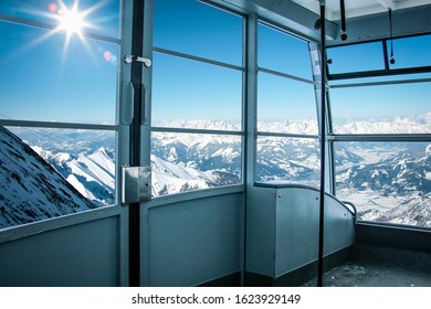 Ski Time In Alps And Photo Of Gondola Interior.