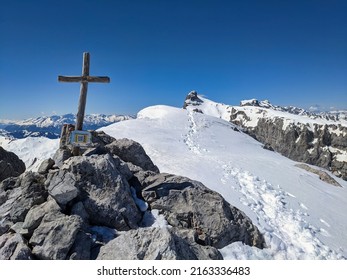 Ski tour on the Wiss Platte mountain above Sankt Antonien in Graubunden, Switzerland. Ski mountaineering in winter. 