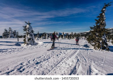 Ski touring in Krkonose National Park, Czech republic. Winter outdoor activity, skialpinism in Giant Mountains. 