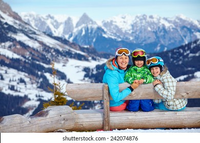 Ski, Winter, Snow, Skiers, Sun And Fun - Two Happy Kids With Mother Enjoying Winter Vacations.