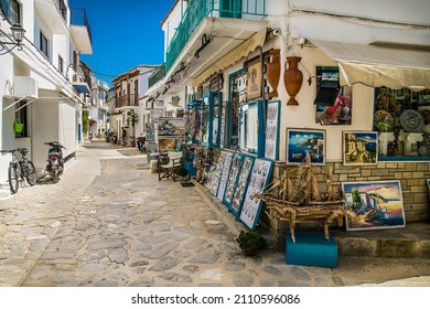 Skiathos, Greece- Avg 10, 2019. Street with  traditional shops  in Skiathos Town, Greece. Europe.