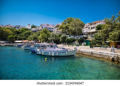 Skiathos, Greece- Avg 10, 2019. Traditional fisher boat anchored in the old harbour on Skiathos Island ,Greece.