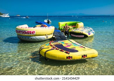 Skiathos, Greece- Avg 10, 2019. Sports equipment for entertainment  at  Koukounaries beach,  Skiathos Island , Greece.