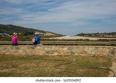 Skiathos, Greece - May 09, 2014, People Watching Airplane Preparing To Take Off On The Island Of Skiathos In Greece