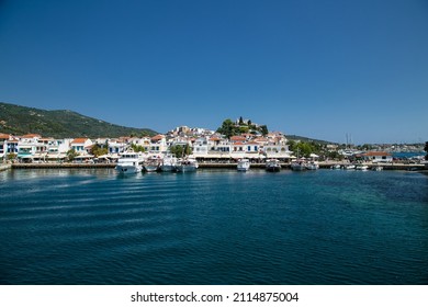Skiathos, Greece-Avg 10, 2019: Harbor in city of Skiathos, located at Skiathos which is one of the greek Sporades islands. Agean sea. Greece.