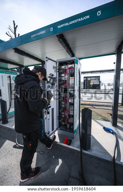 Skien, Norway\
- April 9, 2021:  Fastcharging station from ABB in Skien Norway\
getting maintenance for electric\
car