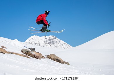 Skier jumps over the mountain on skis - Powered by Shutterstock