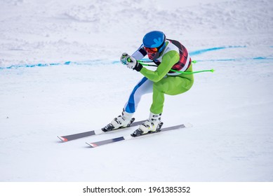 Skier on a slope of the alps