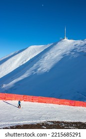 A Skier Skiing In Palandoken Mountain. In The Background, The Peak Of The Palandöken Mountain Is The Dragon Hill. Selective Focus