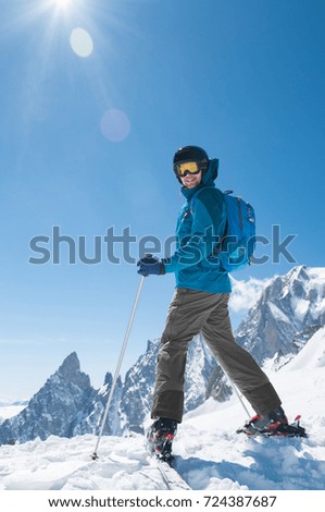 Skier from behind on the mountain