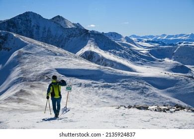 Skier Standing On The Top Of Peak 8 At The Breckenridge Ski Resort In Colorado. Active Lifestyle, Extreme Winter Sports.