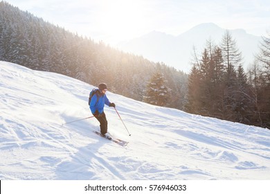 Skier In Sunset Mountains, Downhill Skiing