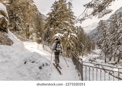 Skiers cross-country skiing in the Hautes-Pyrennees in the ski resort of Cauterets and Pont-d'Espagne