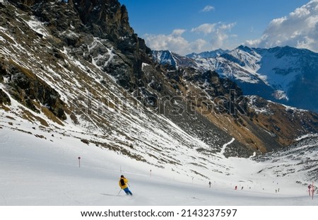 Skiing downhill at beautiful winter landscape of Stelvio National Park, Pejo Ski Resort in Val di Sole valley, Italy. Europe. 