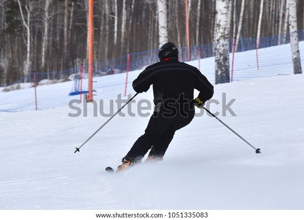 all black skiing outfit