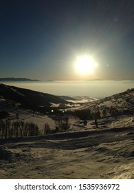 Skiing In Northern Utah With A Great View Of The Inversion And The Wellsville Mountains.