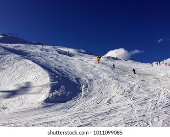 Skiing On The Slopes Of Coronet Peak, Queenstown, New Zealand. 