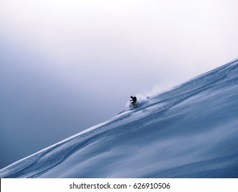 Skiing A Ridgeline In Verbier, Switzerland