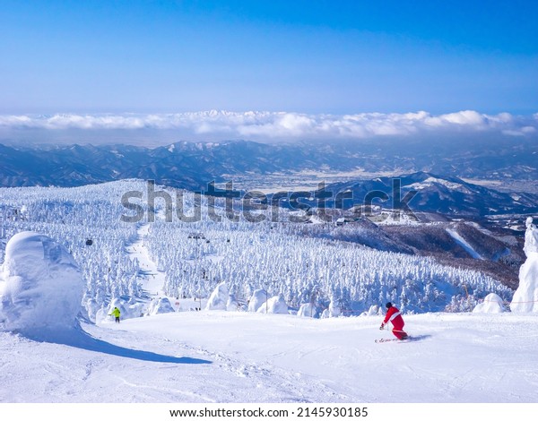 Skiing in a snow monsters (soft rime) plateau\
(Zao, Yamagata, Japan)