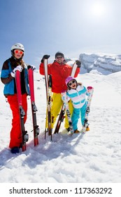 Skiing, Winter Fun - Happy Family Skiers On Ski Holiday