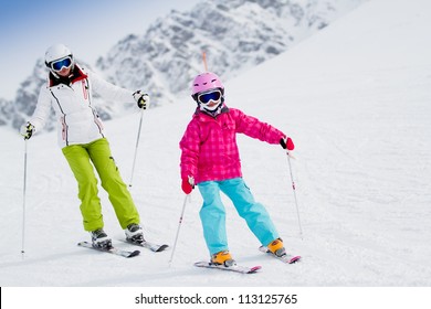 Skiing, Winter, Ski Lesson - Kid With Mother On Mountainside