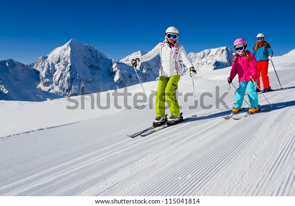 Skiing,\
winter, ski lesson - skiers on\
mountainside