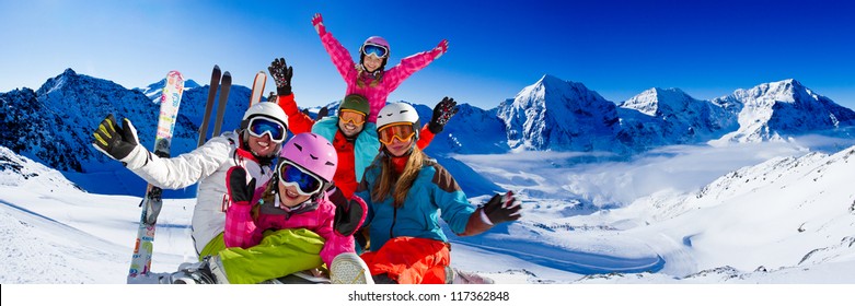 Skiing, Winter, Snow, Sun And Fun - Family Enjoying Winter Vacations