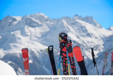 Skiis in front of Alps views