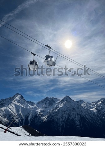 Skilift in front of a mountainview