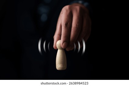 Skill development in action focused hand movements indoor setting photography dark background creative expression