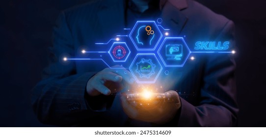 Skill knowledge ability business and technology concept. Work performance is influenced by skill, abilities and competence. Businessman using smartphone to show neon line skills icon on virtual screen