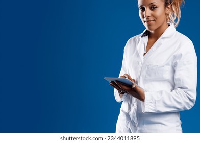Skilled brown-skinned researcher using a tablet; expert in big data, statistics. Doesn't get misled by superficial beliefs, strengthens science