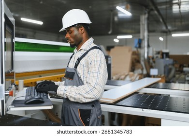 Skilled carpenter operating a cnc machine in a furniture factory, showcasing precision and expertise in modern woodworking