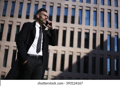 Skilled Confident Leader Of Trading Company Having Phone Conversation With Secretary Assistant Monitoring Work Of Staff Members Being In Business Trip Going To Conference Meeting With Investors