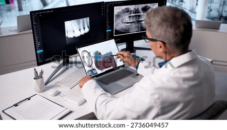 Skilled Dentist Using 3D Imaging On Dental Patient