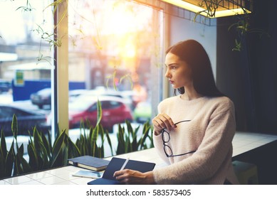 Skilled Female Journalist Creating New Article For Front Page On Fashion Magazine Writing About Healthy Lifestyle Concept Sports And Diet Inspiring By Weather Outside The Window Working In Coffee Shop