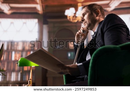 Skilled intelligence agent on a secure landline phone call, discussing confidential information and doing background check on a suspect. Untraceable disposable number in espionage.