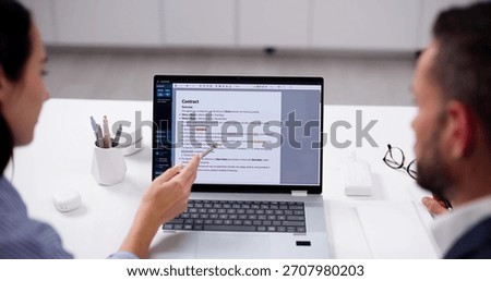 Skilled Online Editor Correcting Errors In Text Manuscript For Book.