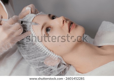 skilled professional performs precise injections using advanced techniques. Ideal for beauty clinics, wellness centers, and medical aesthetic content. Perfect for showcasing cosmetic treatments.