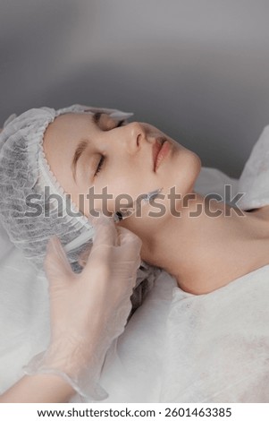 skilled professional performs precise injections using advanced techniques. Ideal for beauty clinics, wellness centers, and medical aesthetic content. Perfect for showcasing cosmetic treatments.