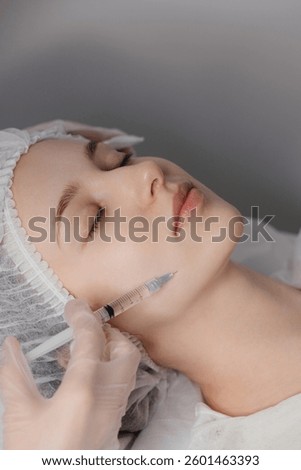 skilled professional performs precise injections using advanced techniques. Ideal for beauty clinics, wellness centers, and medical aesthetic content. Perfect for showcasing cosmetic treatments.
