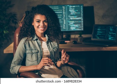 Skilled professional it start-up company executive worker afro american brown hair girl sit chair armchair enjoy evening website javascript framework creating job in workplace workstation - Powered by Shutterstock