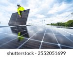 A skilled technician adjusts a solar panel on rooftop, emphasizing the transition to sustainable energy. Equipped with safety gear, the worker demonstrates precision in renewable energy installations.