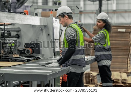 Skilled technician ensures machinery stays in optimal condition. Regular inspections, tests, repairs, upholding standards. Identifying malfunctions, errors for smooth operations in cardboard factory.
