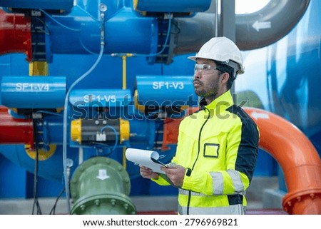A skilled technician is testing the operation of a high-pressure water supply system.