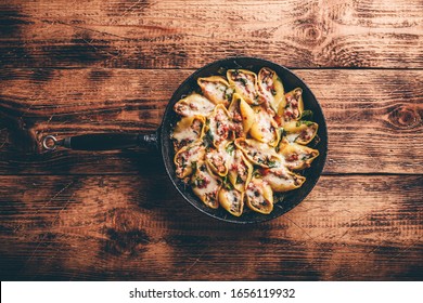 Skillet Of Baked Jumbo Shells Pasta Stuffed With Ground Beef, Spinach And Cheese