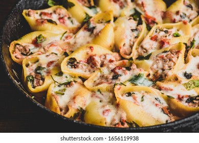 Skillet Of Baked Jumbo Shells Pasta Stuffed With Ground Beef, Spinach And Cheese