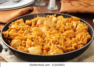 Skillet Dinner Of Chicken, Barbecue Sauce Onions, Red And Green Peppers, Cheese And Noodles