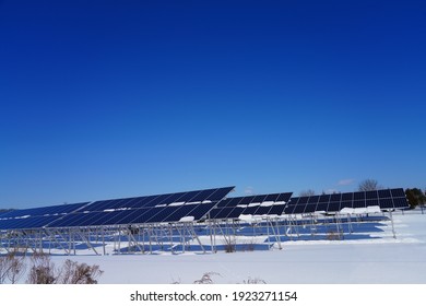 SKILLMAN, NJ -20 FEB 2021- View Of Solar Panels Covered With Snow At A Solar Farm In Montgomery, New Jersey, United States, After A Snowfall.